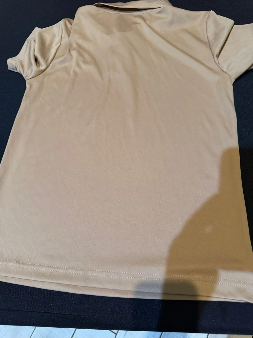 Nike Tan Polo Shirt with White Swoosh